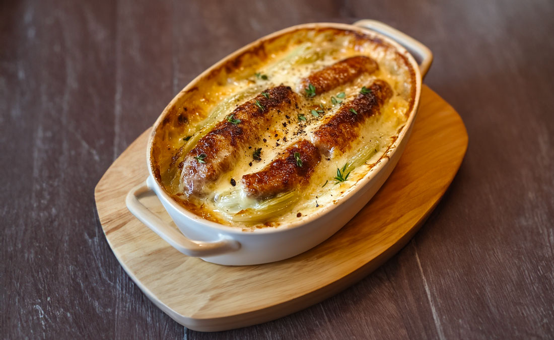 Gratin d’Endives et Saucisses Fumées : Un Plat Réconfortant pour les